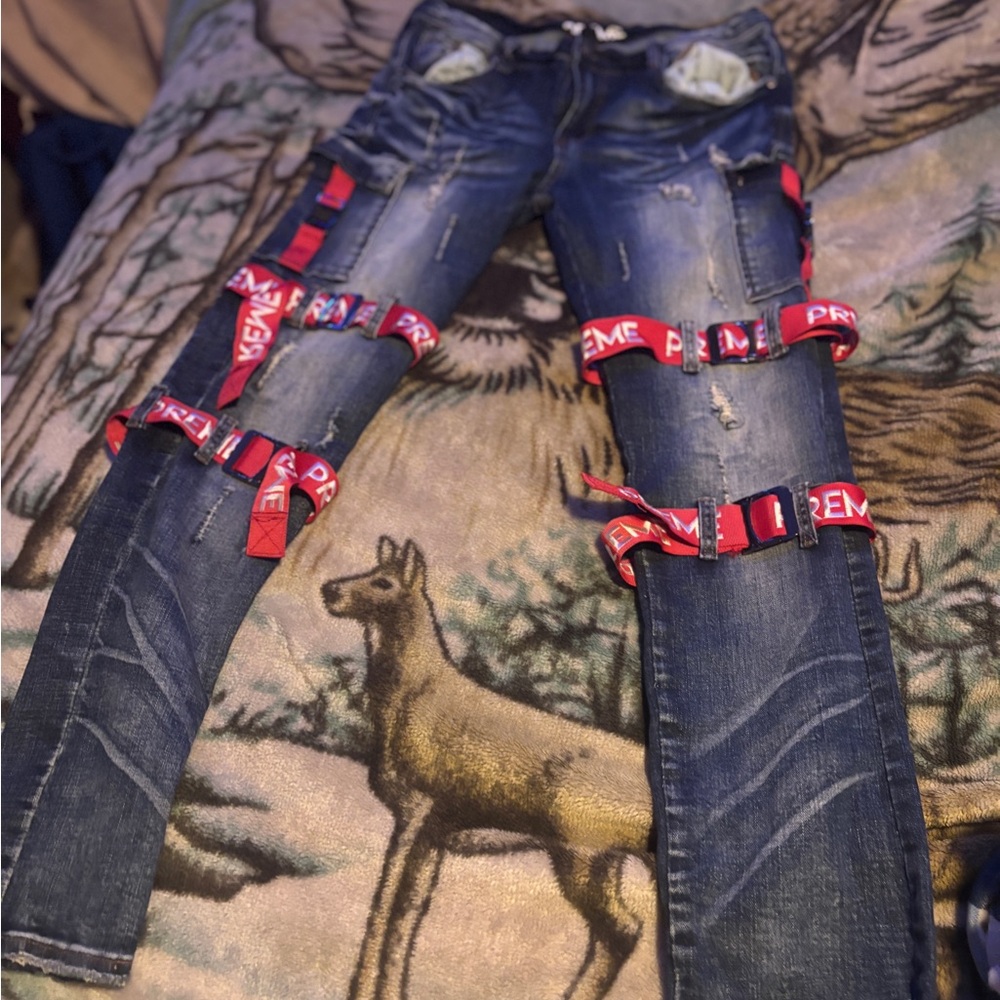 PREME Blue Denim distressed Jeans with Red Straps
